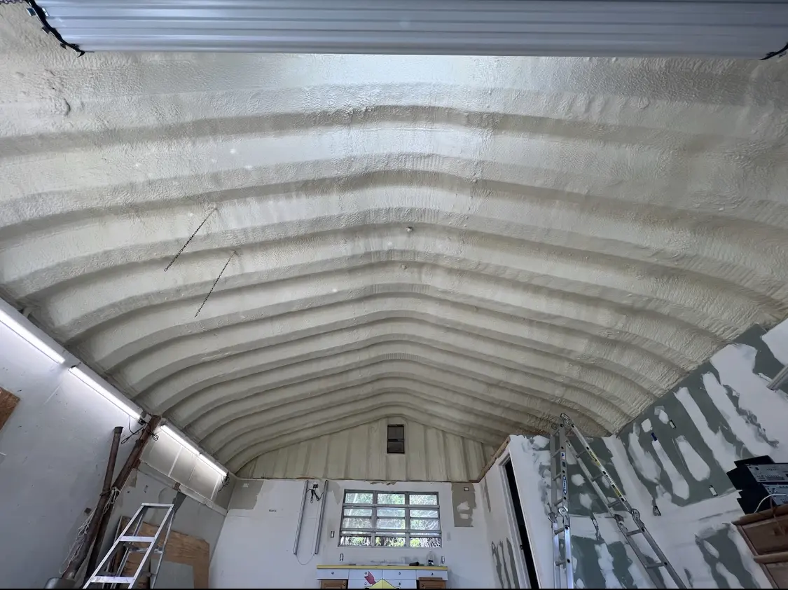 Spray polyurethane foam applied to the underside of a metal roof deck in South San Jose Hills
